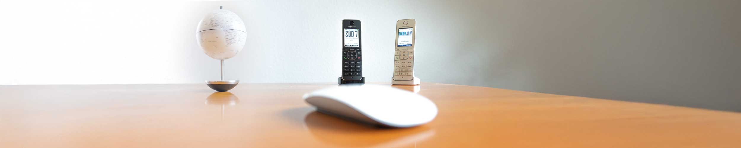 Telefone mit SÜD7 und GlobenShop